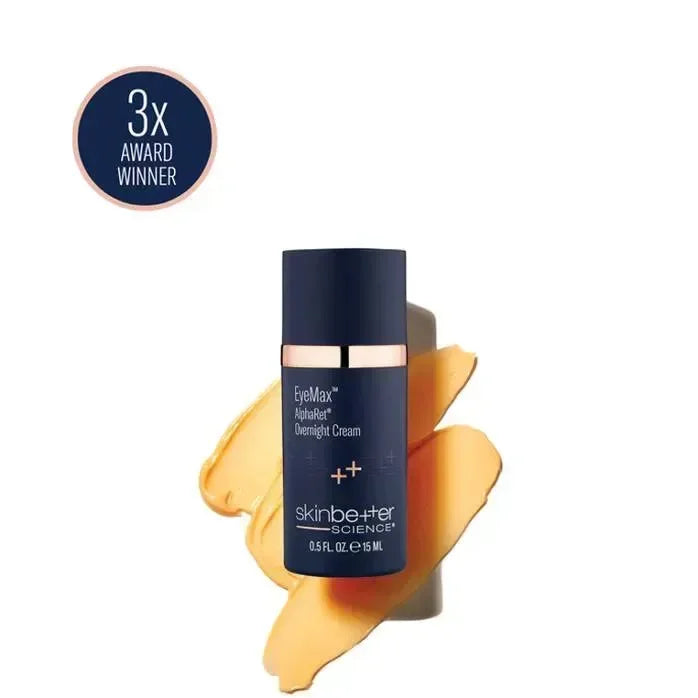 skinbetter EyeMax AlphaRet Overnight Cream navy bottle with a gold band beside a smeared cream texture swatch.