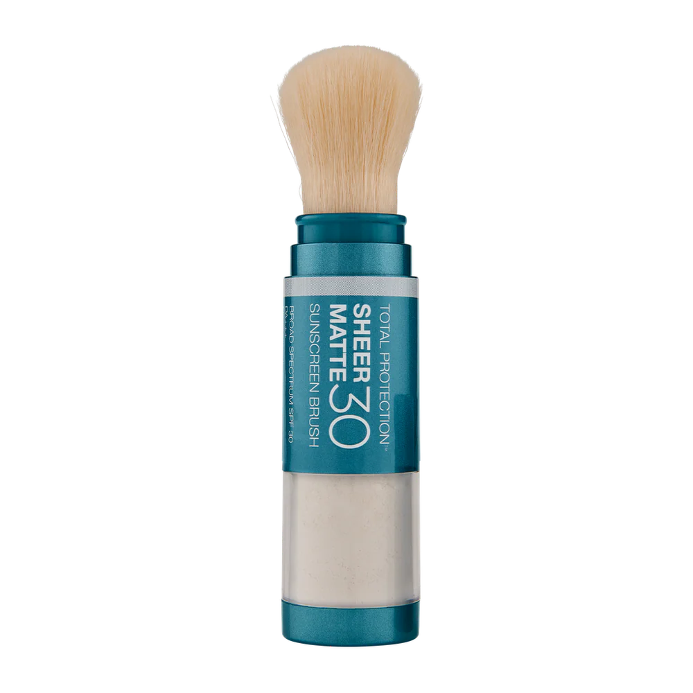 Colorescience Sunforgettable Total Protection Sheer Matte SPF 30 sunscreen brush standing upright on white.