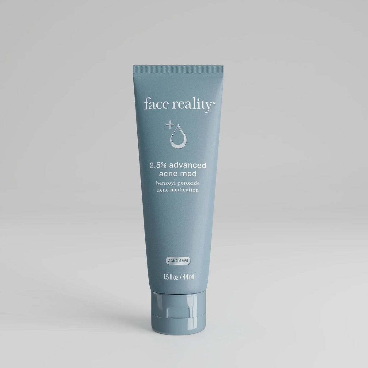 Face Reality 2.5% advanced acne med benzoyl peroxide skincare tube on plain background