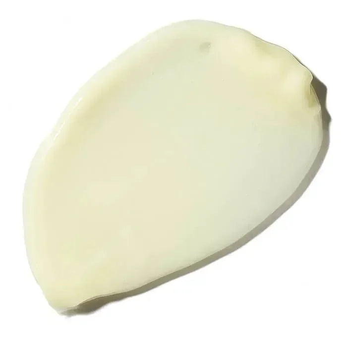 Close-up of a pale yellow serum texture swatch for skinbetter's AlphaRet Clearing Serum on a white background.