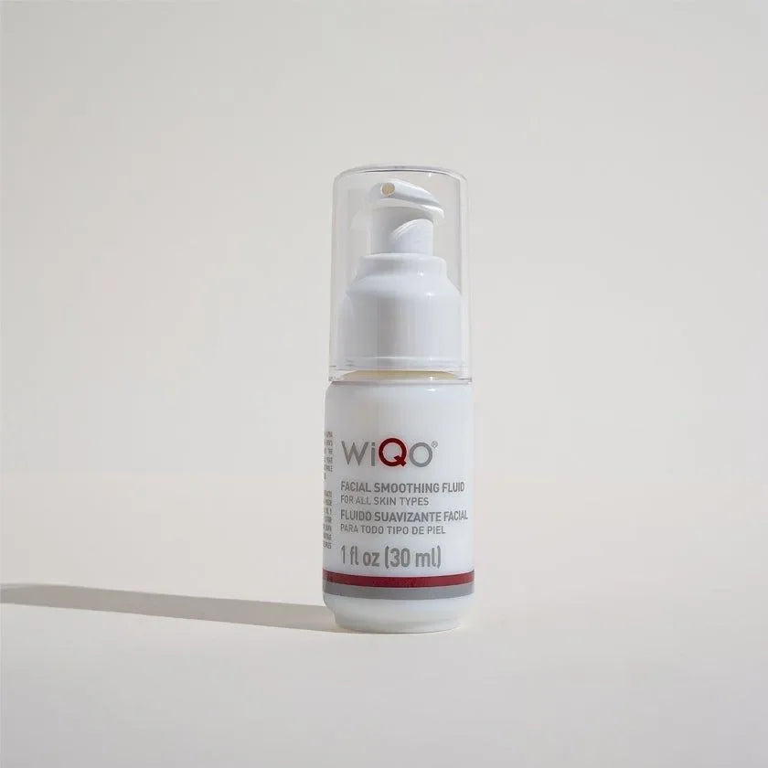 WiQo Facial Smoothing Fluid white pump bottle, 1 fl oz, on a plain white background, a packshot photo.